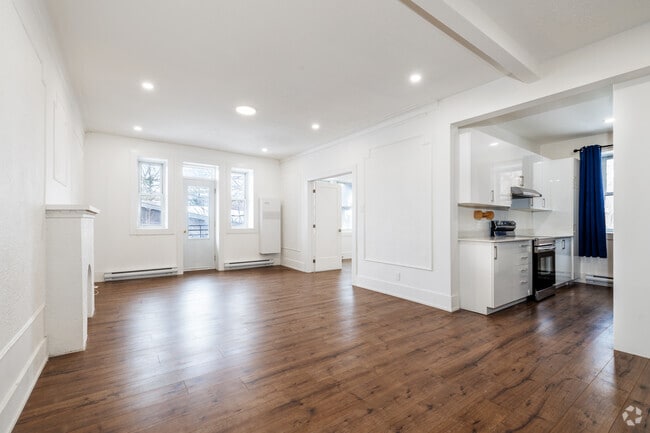 2BR, 1BA - 1250SF - Living Room - Plaza Court