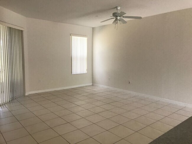 Photo - Spacious 3-Bedroom with 2 Full Baths in Kissimmee, Located on a Golf Course in the beautiful comm...