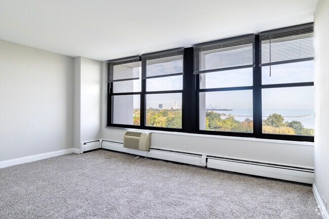 2BR2BA-Primary Bedroom - Oglesby Towers Apartments