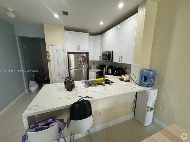 Building Photo - 17620 NW 73rd Ave Unit 206-17 Rental
