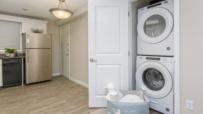 Experience the convenience of at-home laundry with a full-size, stackable washer and dryer in select apartments. - The Willows