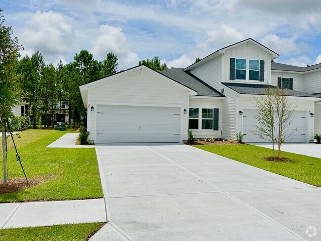 Building Photo - Townhouse with amenity packed neighborhood...