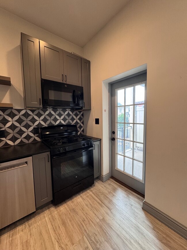 Balcony door off of kitchen