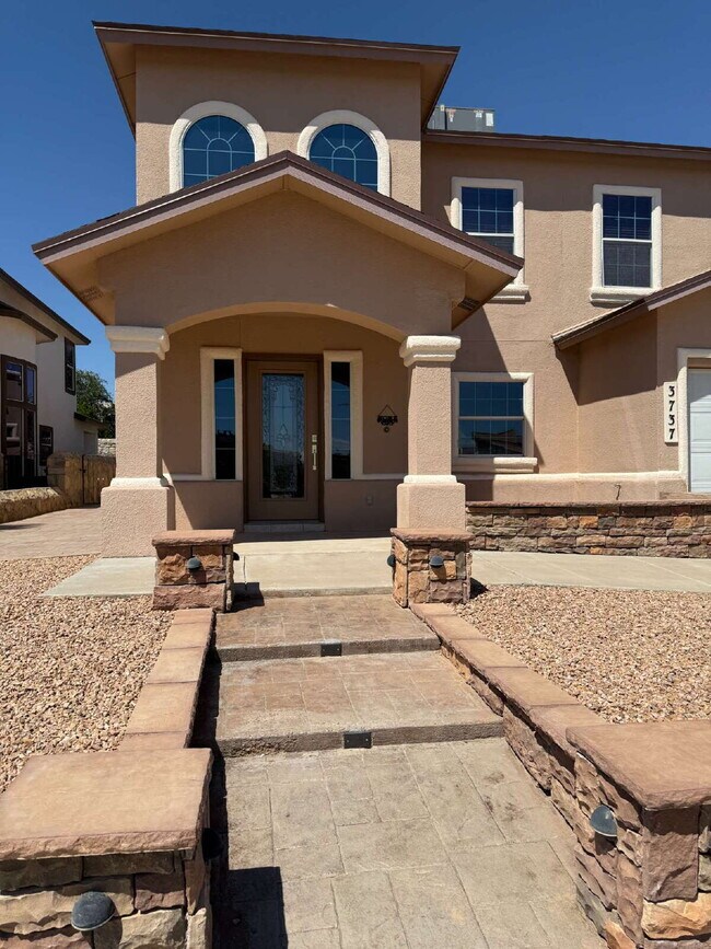 Photo - "Spacious 4-Bedroom Oasis with Granite Kit...