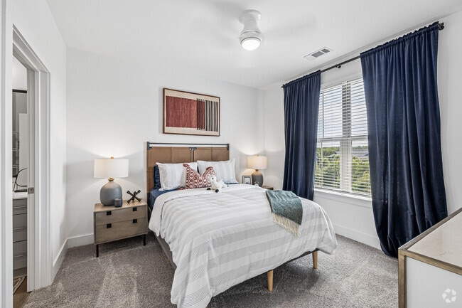 2BR, 2BA - 1,084SF - Primary Bedroom