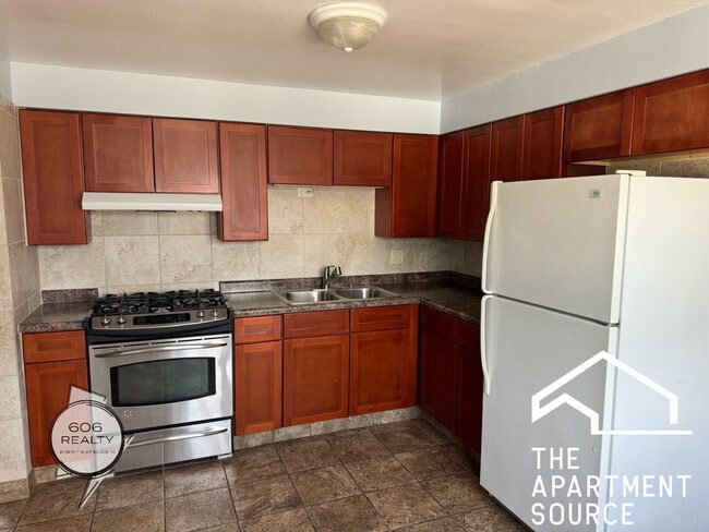 Building Photo - 3556 N Nagle Ave Unit 2W