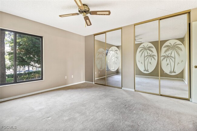 Building Photo - 7430 Lake Breeze Dr Unit 206