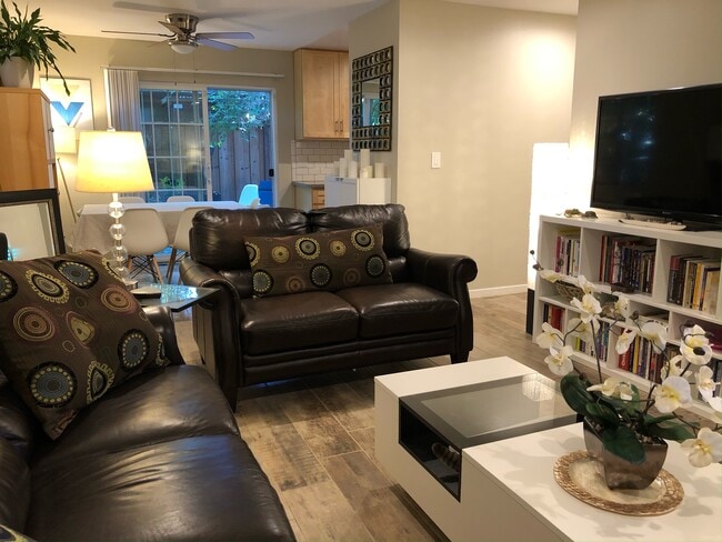 Alternate view of living room/eating area (furnished to show scale) - 228 Madrone St Unit 5