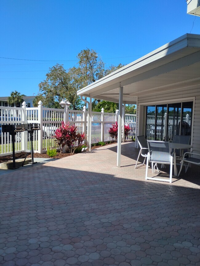 Pool Area with Grills - 6932 Stones Throw Cir N Unit #7101