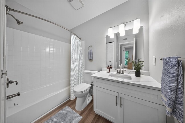 Elevate your daily routine in this stylish bathroom at The Woods at Ambler, an Eagle Rock Community. Enjoy modern finishes and ample space for relaxation. Make your move today and embrace a new standard of living!