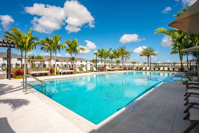 Resort-Style Swimming Pool with Cabanas - Catalina at Miramar Townhomes