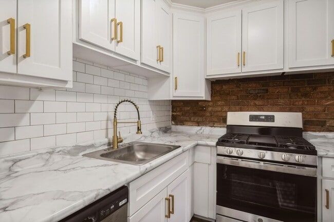 Arlington Village - Cocina con una cama - Arlington Village