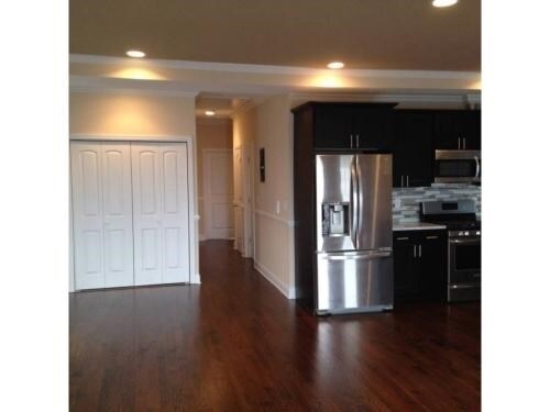 Glimpse of kitchen, hardwood floors and general color scheme in apt. - 362 Terrace Ave Unit 1