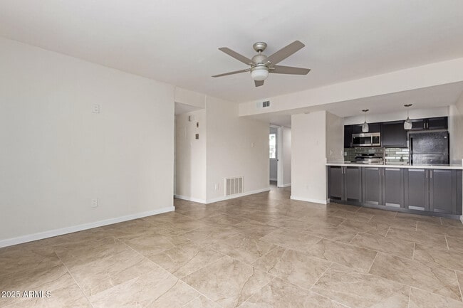 Building Photo - 3314 N 68th St Unit 247