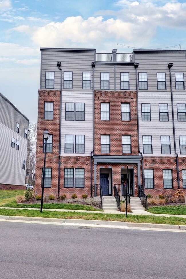 Photo - Three Story Brick End Unit with Rooftop Terrace