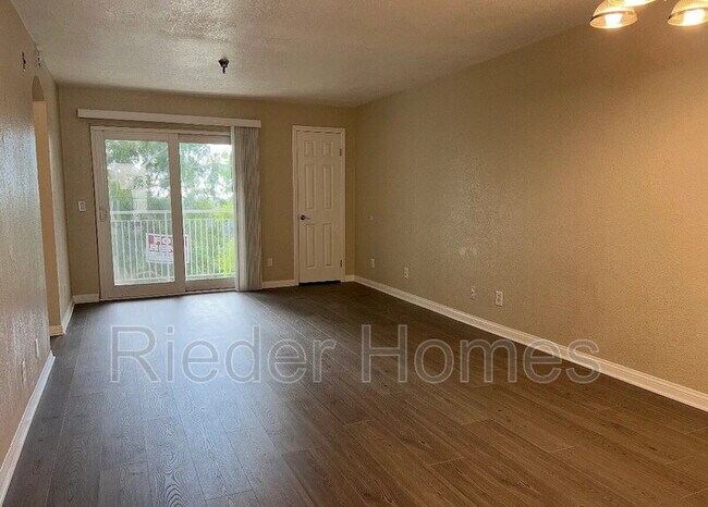 Building Photo - 5252 Orange Ave Unit 127