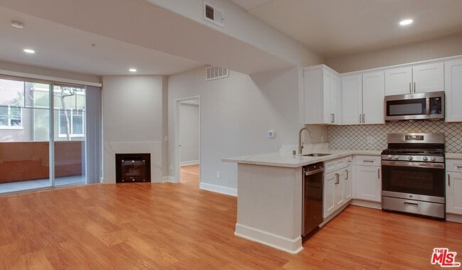 Photo - 5551 W 6th St Unit 3-119