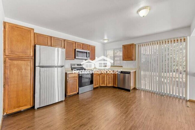 Photo - Great Price!!!  Minutes from Higlands Ranch Rec Center.  Bright living room, all stainless steel ...