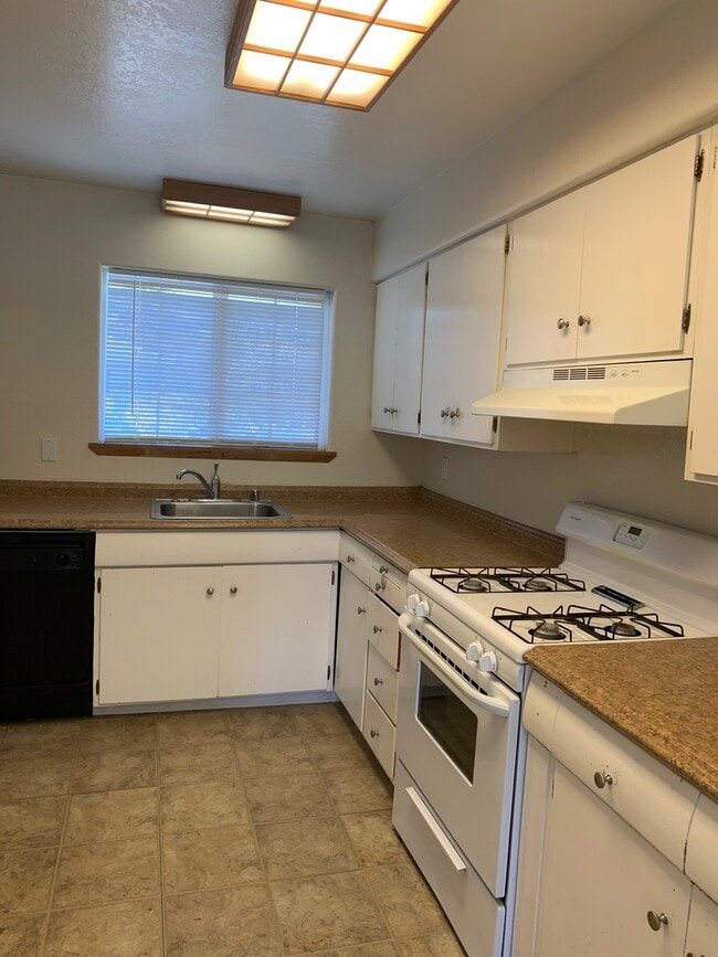 Photo - Cosigners okay =)  4 Large Bedrooms and 2 Full Baths ~ Small Pet Negotiable
