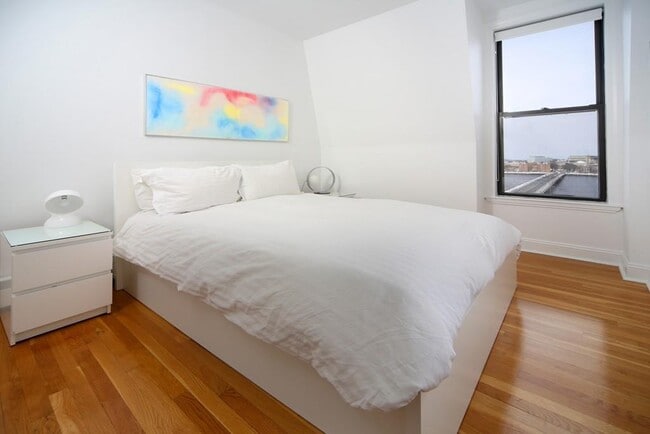 Bedroom with Charles River and City views - 483 Beacon St Unit Apt 91
