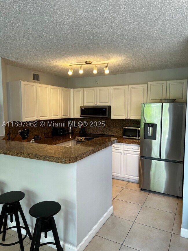 Photo - 19501 E Country Club Dr Unit 9404