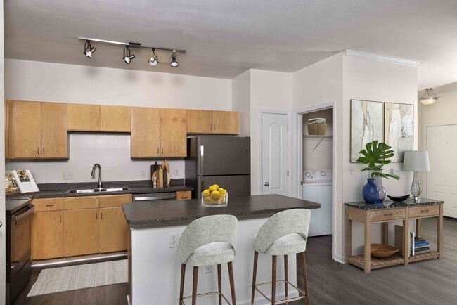 Gourmet kitchen with custom cabinetry and large island