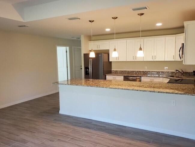 Photo - Coming Soon Newer 3x2 Duplex Unit Unit 4740 13TH ST SW