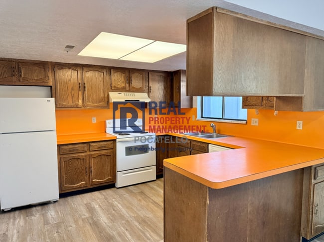 Photo - 3 bedroom 1.5 bath townhouse - 2 car carport
