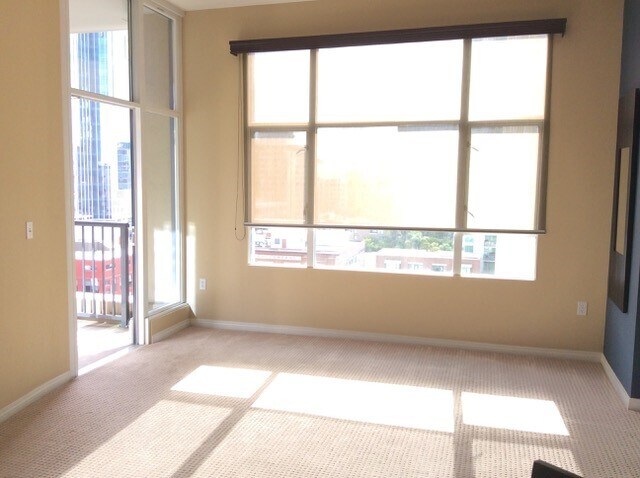 Living Room & Door to Balcony - 530 K St Unit San Diego Gaslamp Quarter