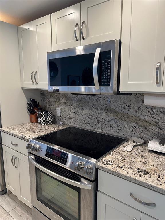Photo - 440 S Gulfview Blvd Unit 1102