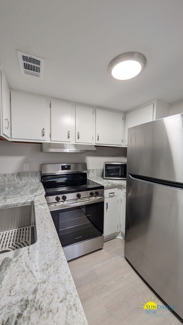 Photo - Expansive waterfront covered patio off this fully renovated Fort Walton Condo!