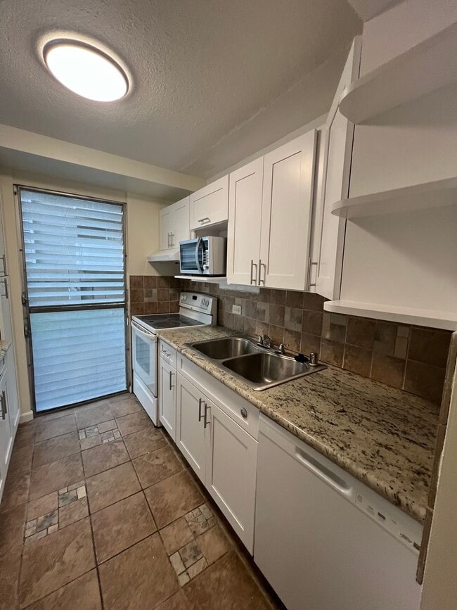 Photo - 1 bedroom, 1 bath, 1 parking in the heart ... Unidad 104