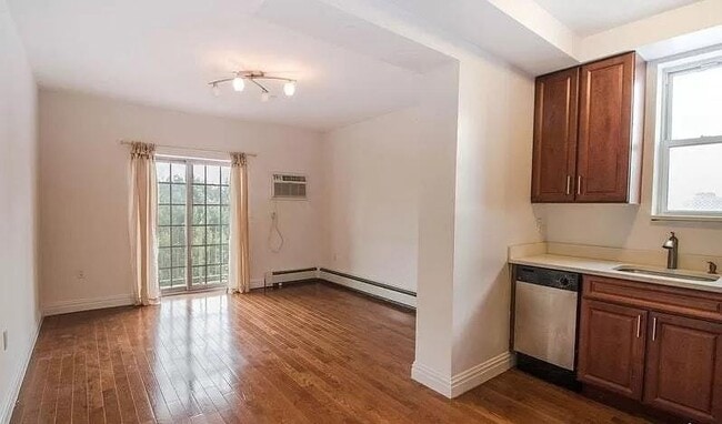 Building Photo - 25-25 Newtown Ave