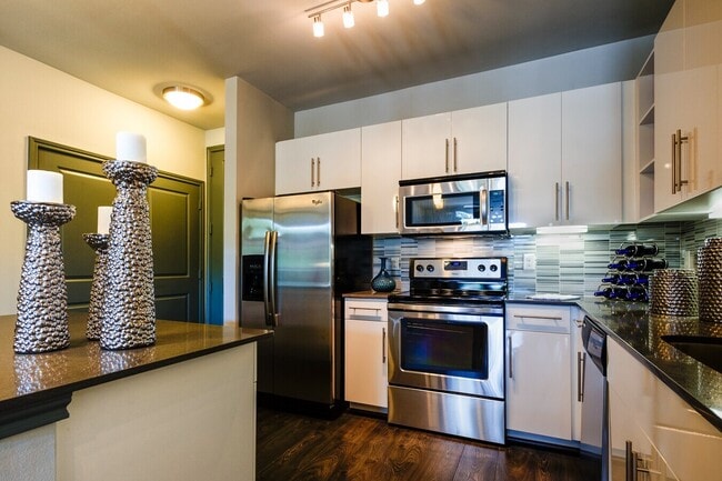Building Photo - Stylish Living Starts Here Unit PLGY1