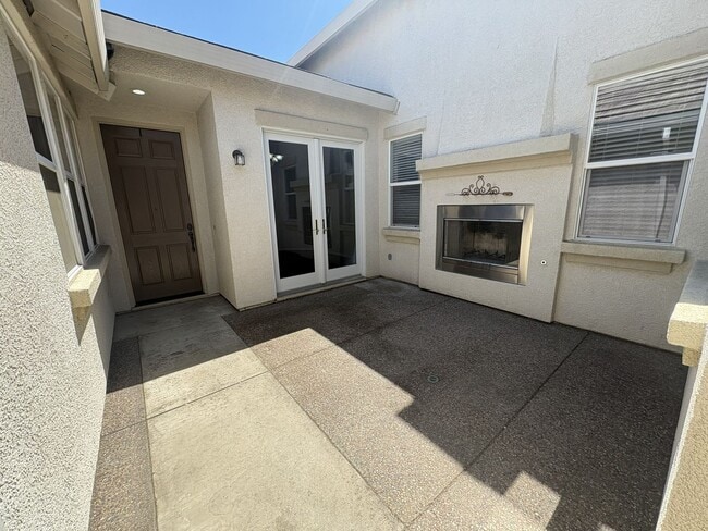 Photo - Unique Home with Outdoor Wood Burning Fireplace