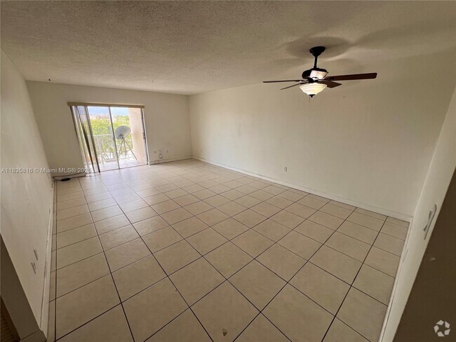 Building Photo - 7727 SW 86th St Unit A1-406 Rental