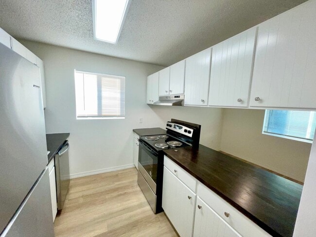Building Photo - RENOVATED 2BD/1BA MILLWOOD APARTMENT | A/C | COVERED PARKING | PET FRIENDLY | AVAIL APRIL 15, 2026 Unit 8909