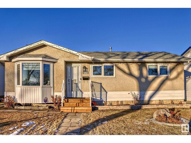 Building Photo - 6124-6137 137 Ave NW