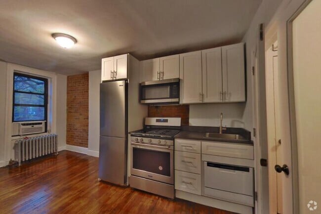 Building Photo - 410 E 13th St Rental