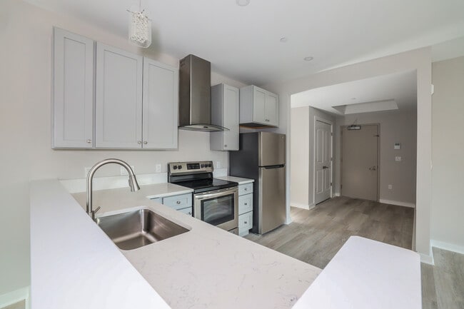 Unit 107 Kitchen - Liberty Plaza Suites