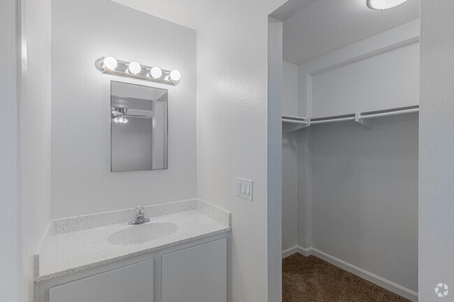 2BR, 1.5BA - 940SF - Vanity and Walk-in Closet