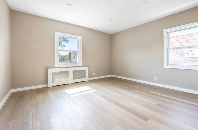 Photo - 208-12 53rd Ave