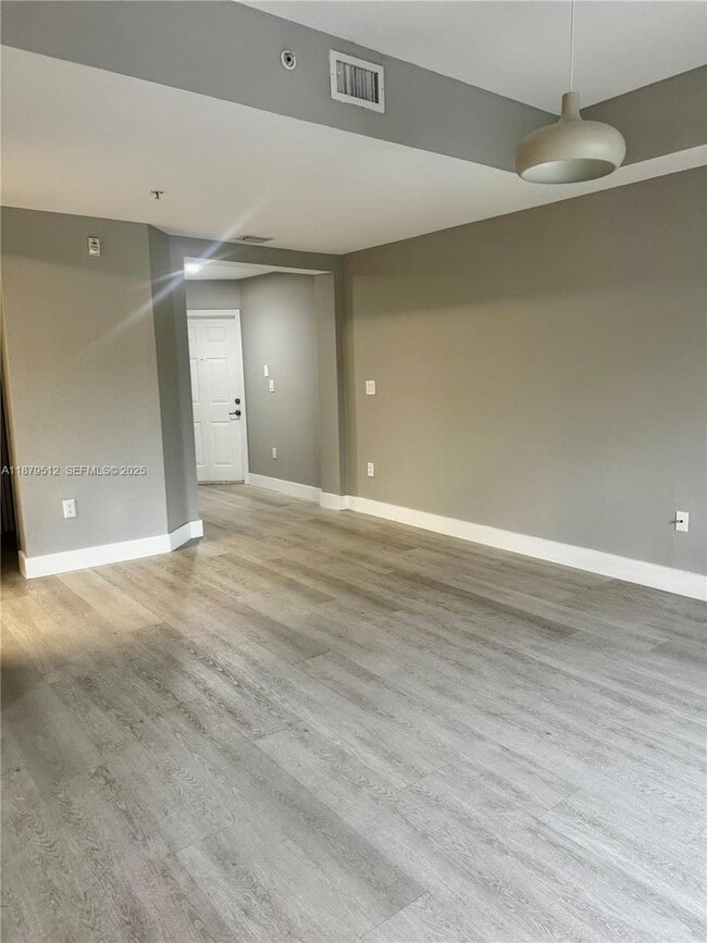 Building Photo - 11403 NW 89th St Unit 209