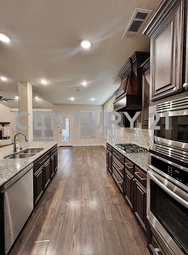 Photo - Executive 2-Story 5/4/2 with Sparkling In-Ground Pool in Mansfield!