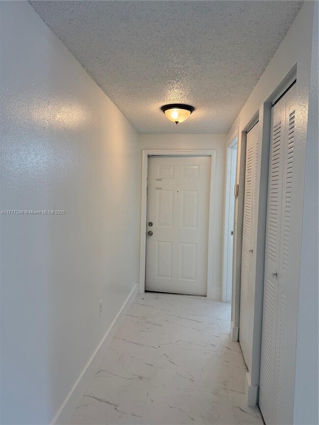Building Photo - 3221 Sabal Palm Manor Unit 105 Rental