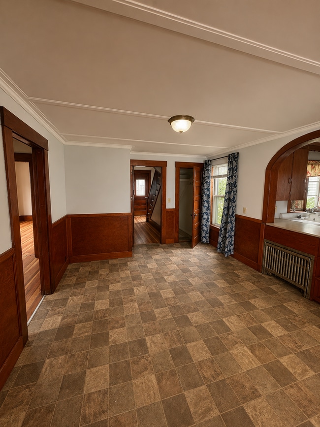 Photo - Spacious 4-Bedroom Home with Garage, Fenced Yard & Historic Character | Rochester, NH