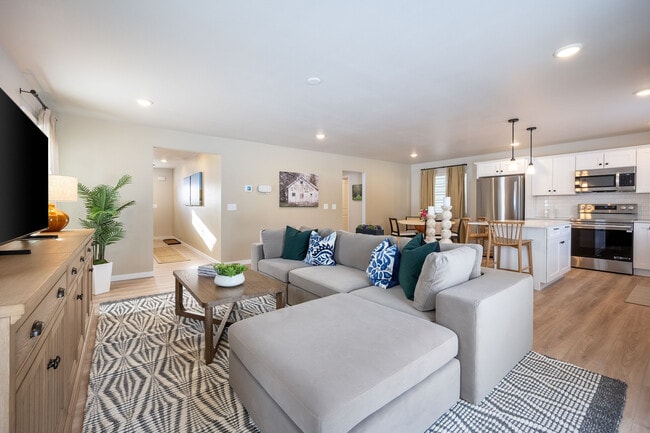 An inviting living space with clean lines and plenty of room to kick back, recharge, and feel right at home. - Liv East Bay