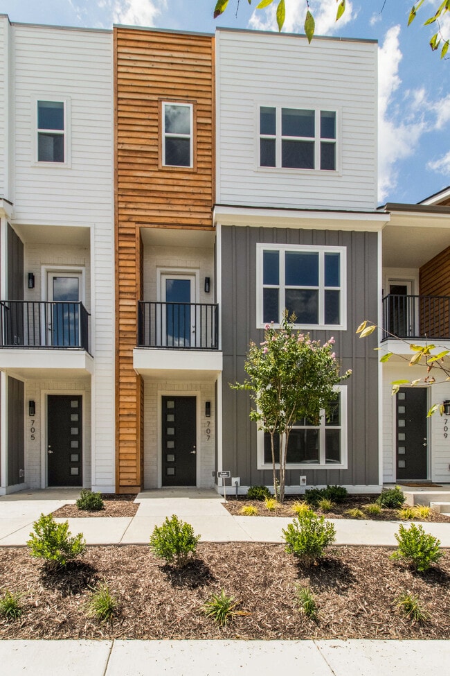 Front Exterior with nice landscape - 707 Vernon Ave Townhome