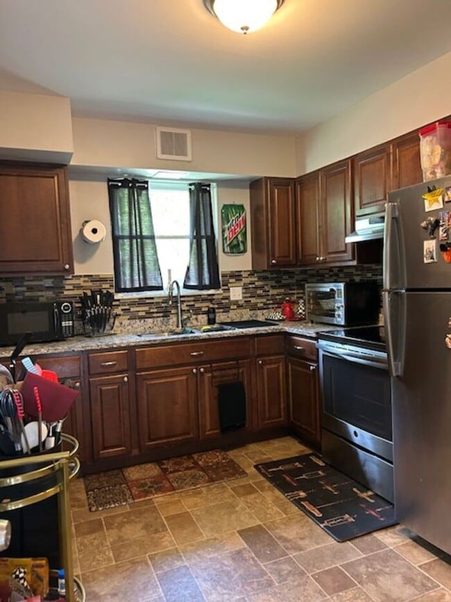 Photo - Adorable 2BR 1.5BA w/ Attached Garage • Yard in Roselawn