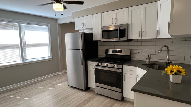 Building Photo - 4835 Hull St Unit 2W